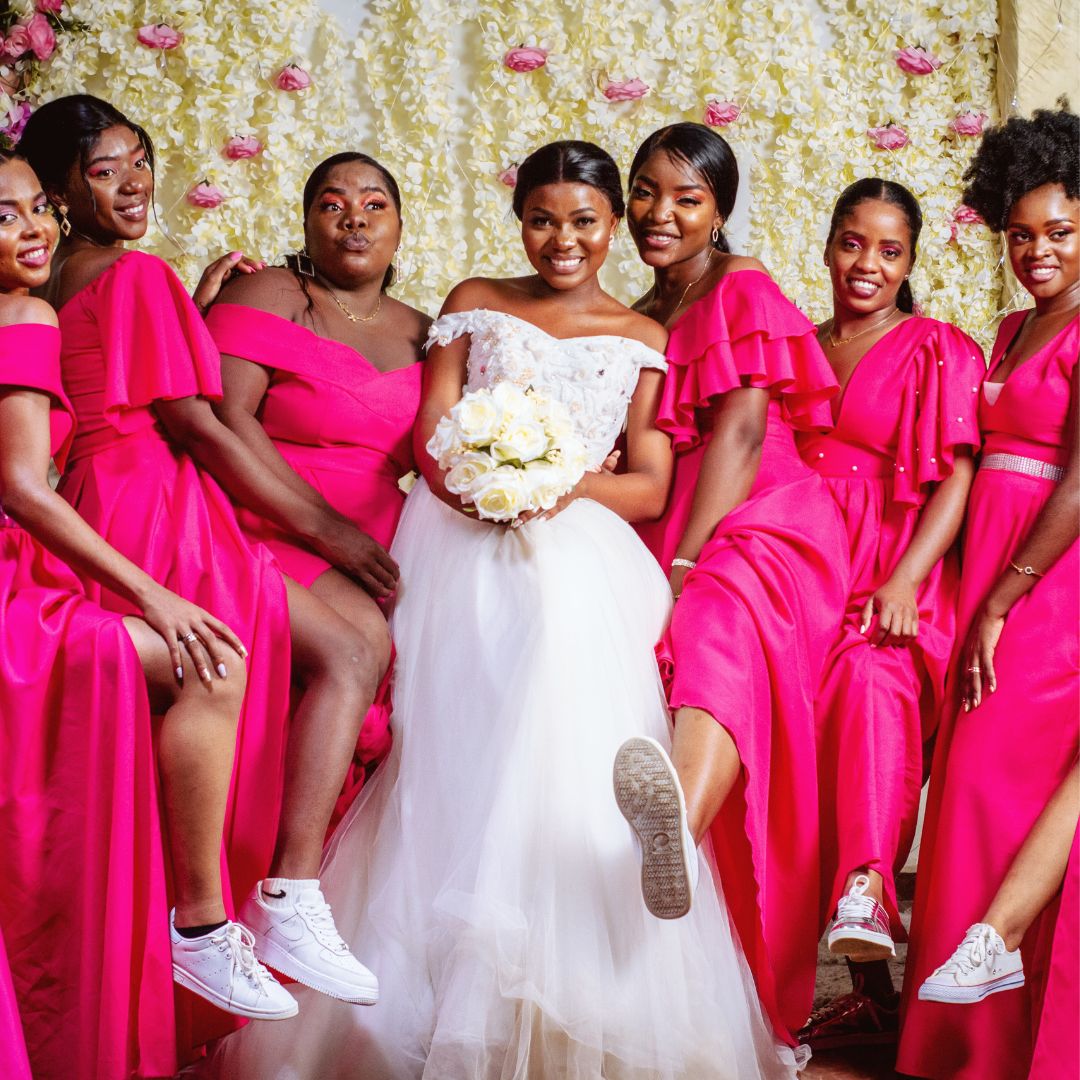 Celebrating with Style: A Bride and Her Bridesmaids Embrace Fun, Friendship, and Fashion