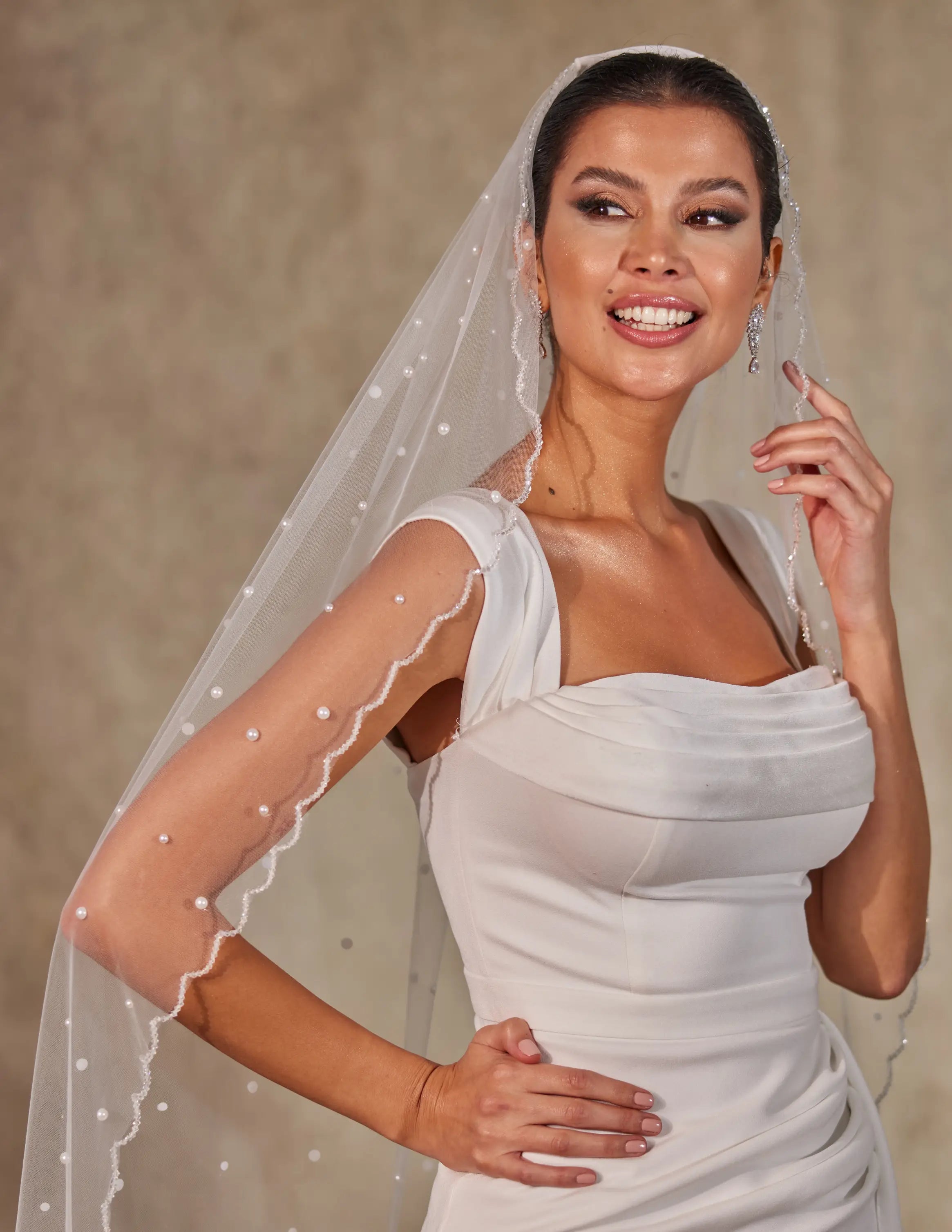 Complete your look with Our Pearl Bridal Veil