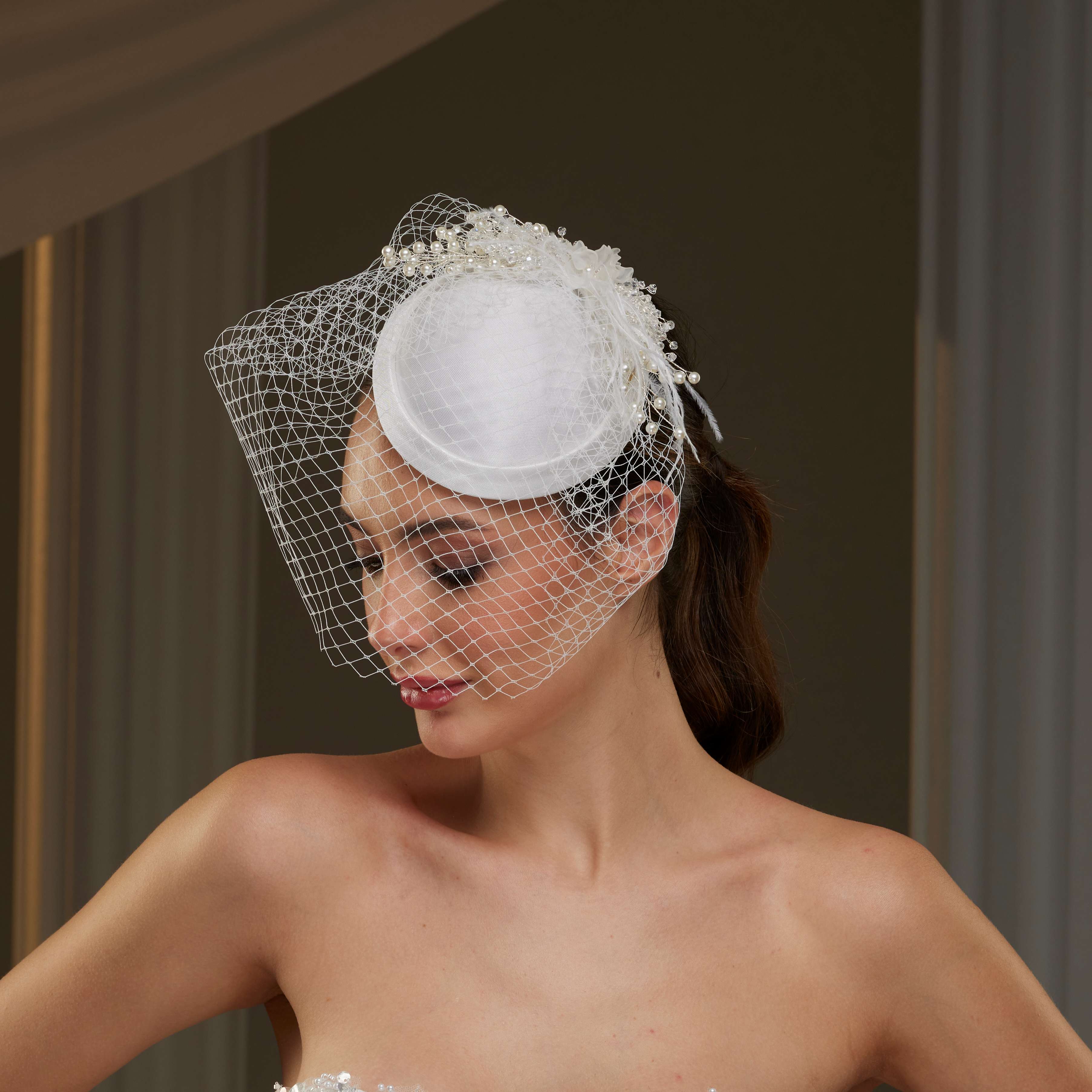 Elegant  Bridal Fascinator with Birdcage Veil, Pearls & Feathers